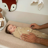 Baby on the Meyco Changing Pad Cover Teddy Sand