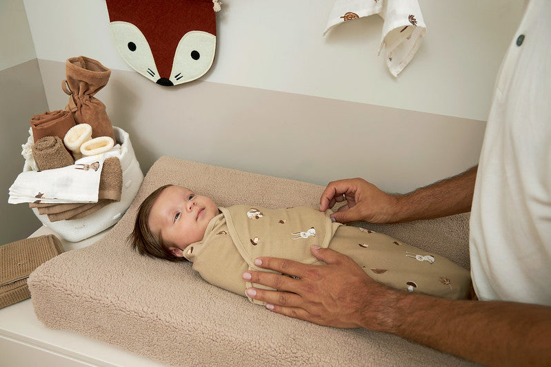 Baby on the Meyco Changing Pad Cover Teddy Sand