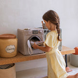 Girl with Lorena Canals Washing Machine basket