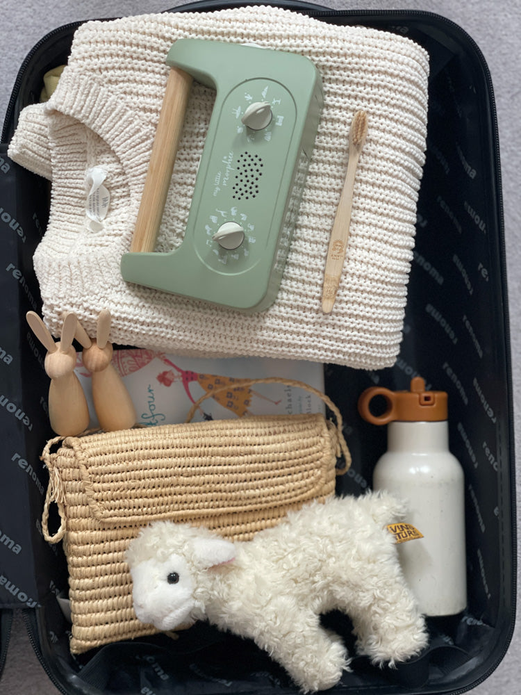 My Little Morphee Childrens Sleep and Meditation Box with other kids items in a suitcase