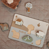 Jollein wooden puzzle farm on a blanket