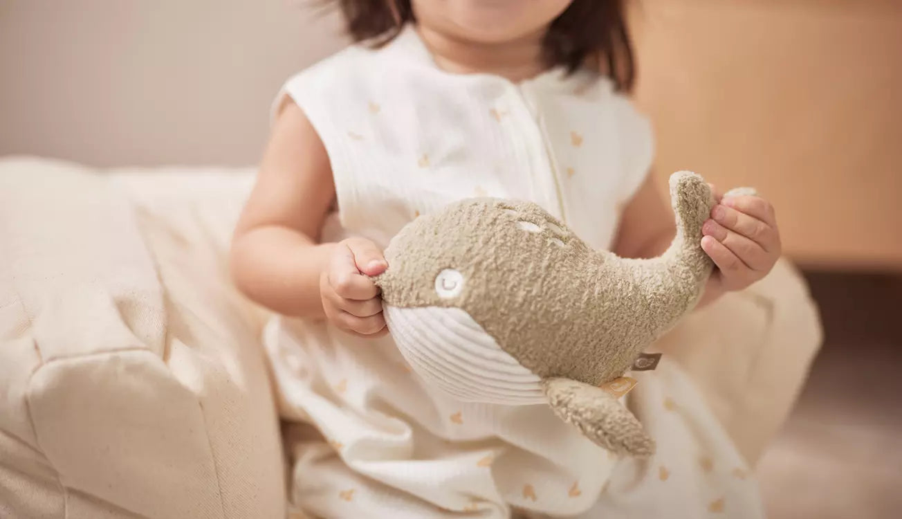 Kid holding Jollein Activity Toy Deepsea Whale