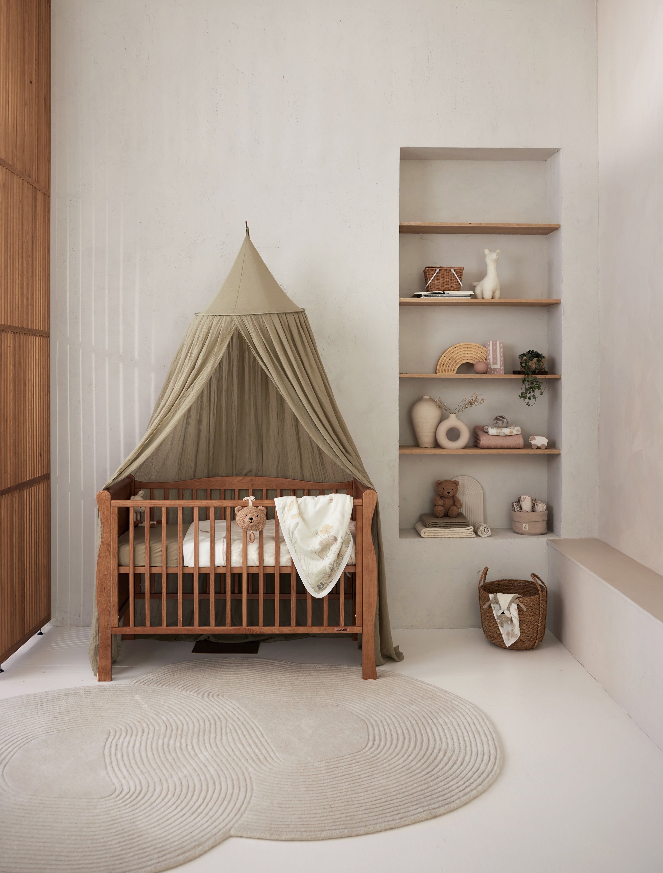 Jollein Canopy olive green in a nursery room