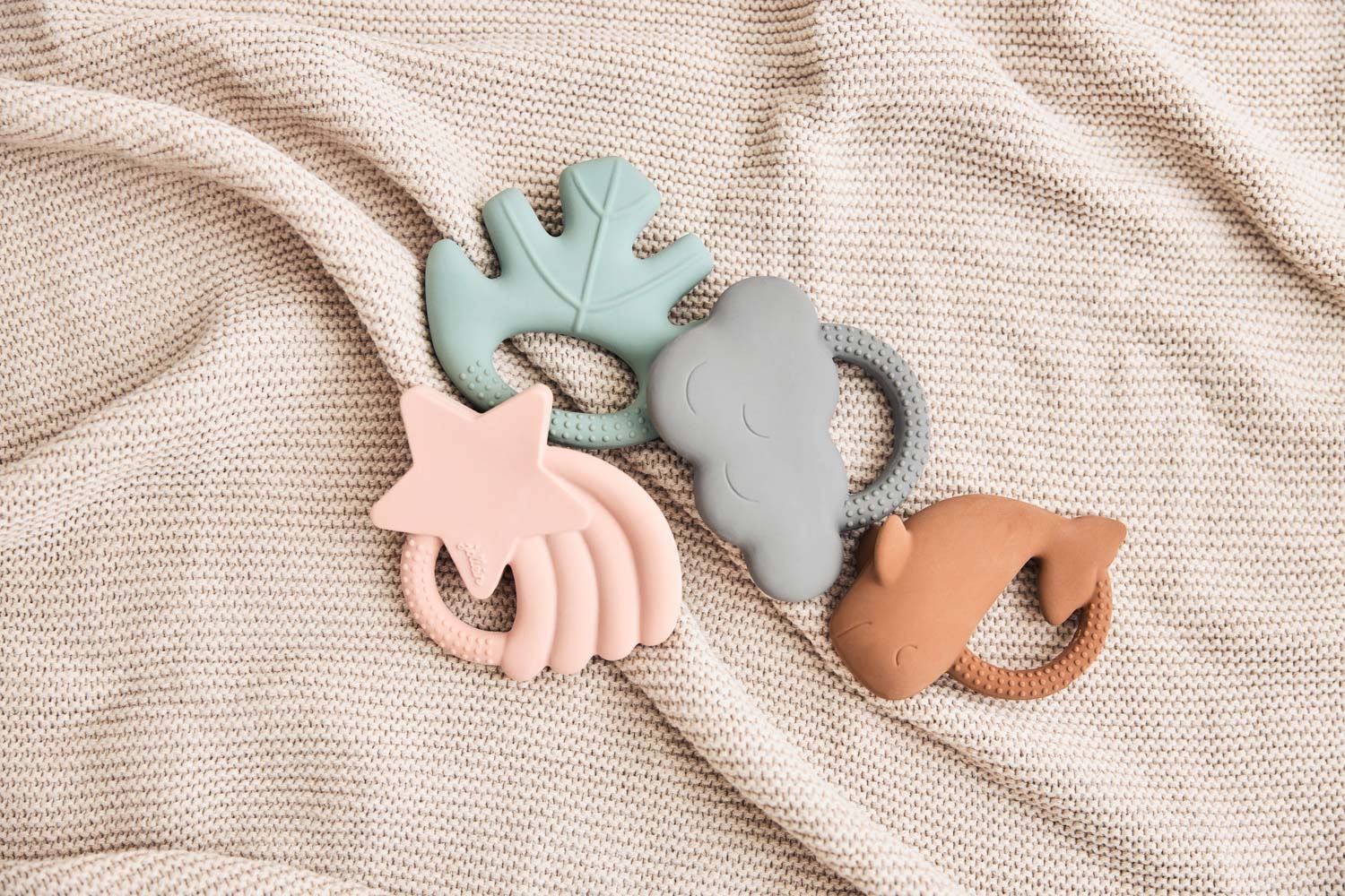 Jollein teething ring cloud in storm grey color with other teething rings