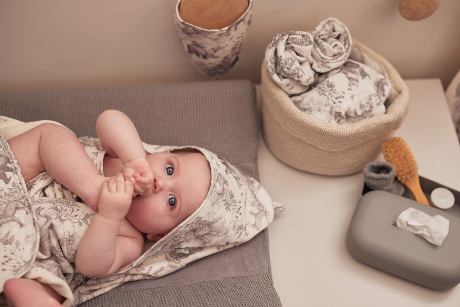 baby with Jollein silicone wet wipes cover storm grey
