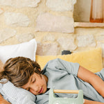 Kid sleeping with the My Little Morphee Childrens Sleep and Meditation Box