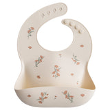 Mushie silicone bib pink flowers