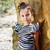 Girl wearing Pepita and me Picabuey Negro swimsuit