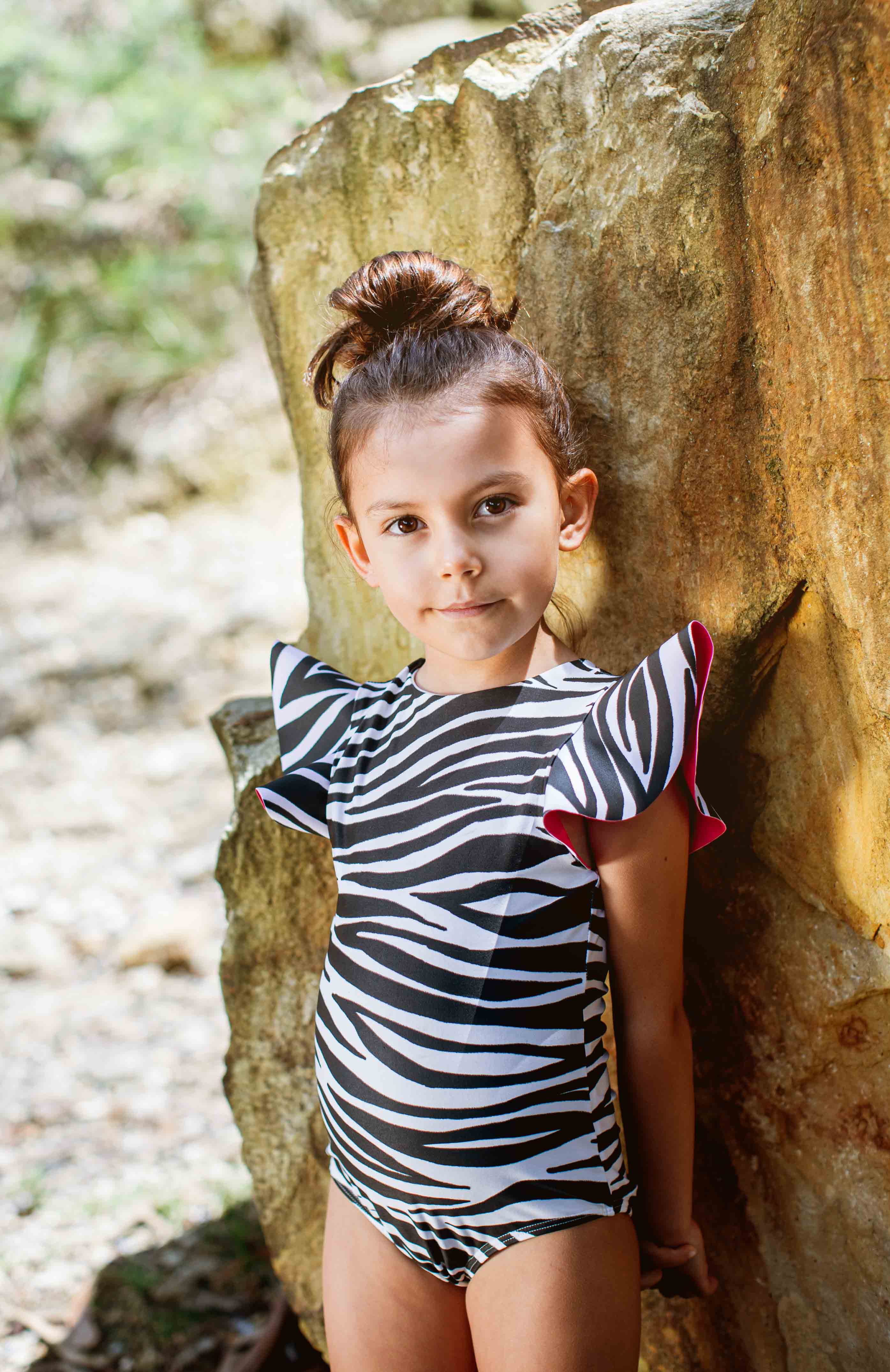 Girl wearing Pepita and me Picabuey Negro swimsuit