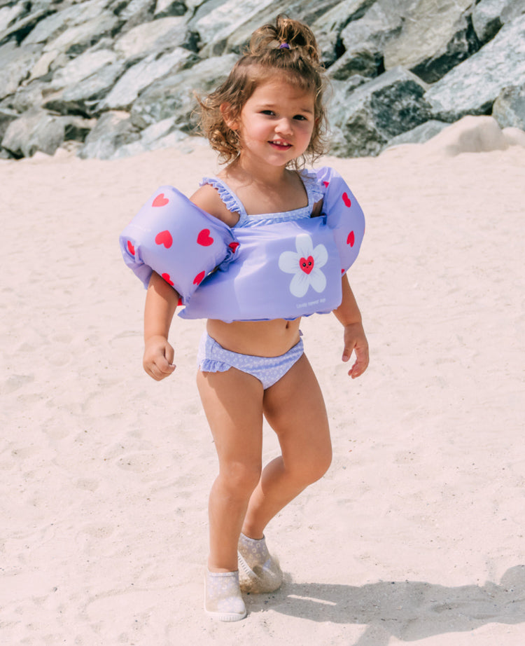 Girl with Swim Essentials Puddle Jumper  Flower Heart