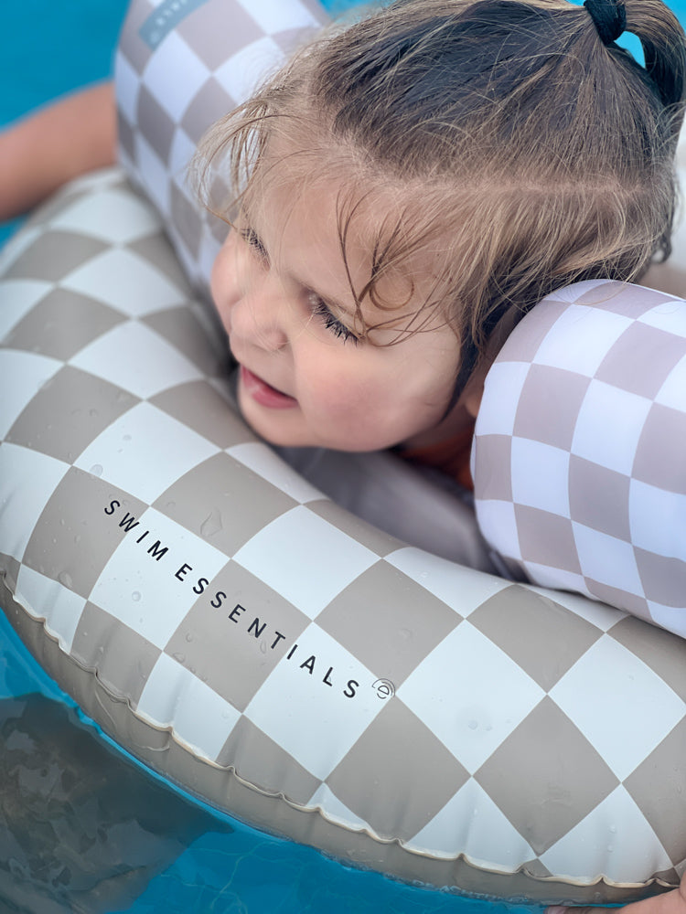 Swim Essentials 55cm Swim Ring Sand Check with girl swimming