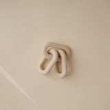 Mushie Teether Links Shifting Sand from top