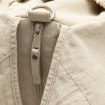 Jollein Urban diaper bag in Warm Sand, close-up of the zip fastening