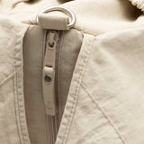 Jollein Urban diaper bag in Warm Sand, close-up of the zip fastening