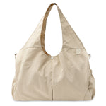 Jollein Urban diaper bag in Warm Sand with carry handles, front view