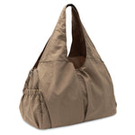 Jollein Urban diaper bag in Earthy, angled view showing the side pocket