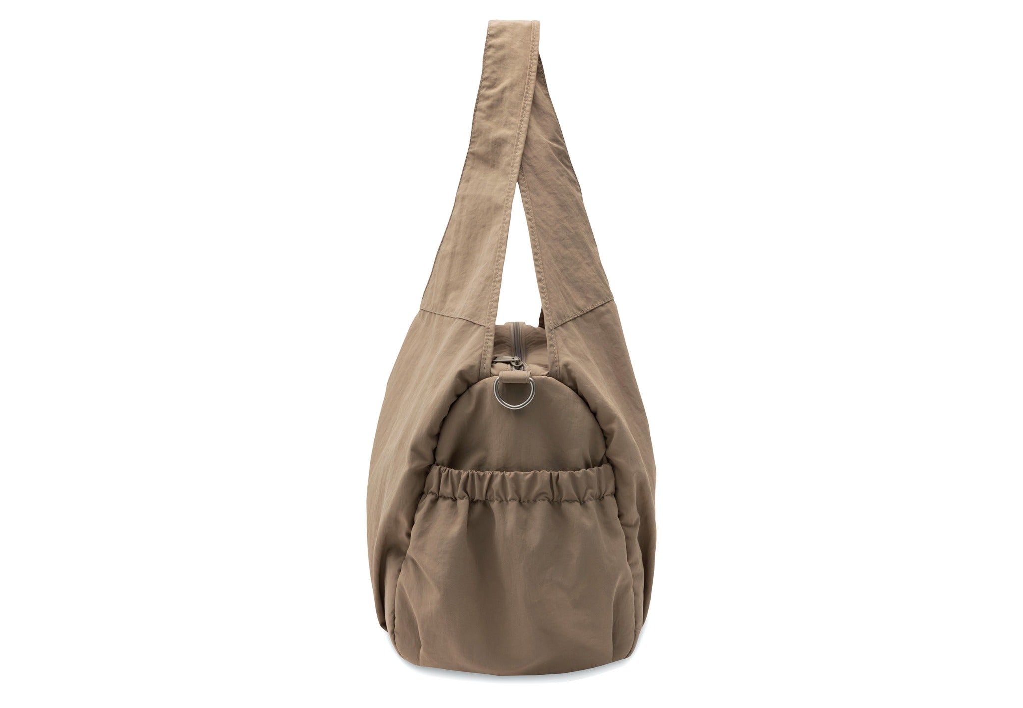 Jollein Urban diaper bag in Earthy, side view showing the gathered pocket