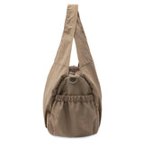 Jollein Urban diaper bag in Earthy, side view showing the gathered pocket