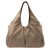 Jollein Urban diaper bag in Earthy with carry handles, front view
