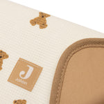 Jollein Little Waffle changing pad in Mini Teddy Bear, close-up of waffle fabric and brown edging