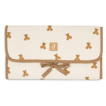Jollein Little Waffle changing pad in Mini Teddy Bear, folded with tie fastening