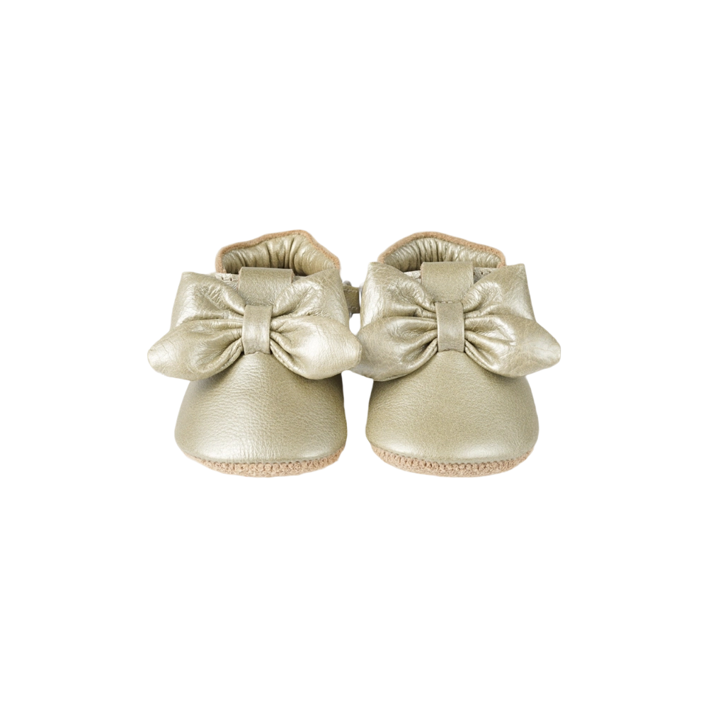 Donsje Celie baby shoes in Champagne Metallic Leather with bow details, front view
