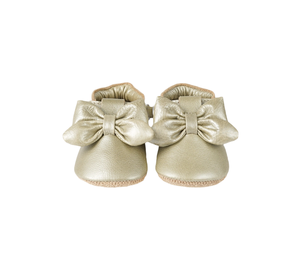 Donsje Celie baby shoes in Champagne Metallic Leather with bow details, front view