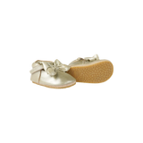Donsje Celie baby shoes in Champagne Metallic Leather, side view showing the textured sole