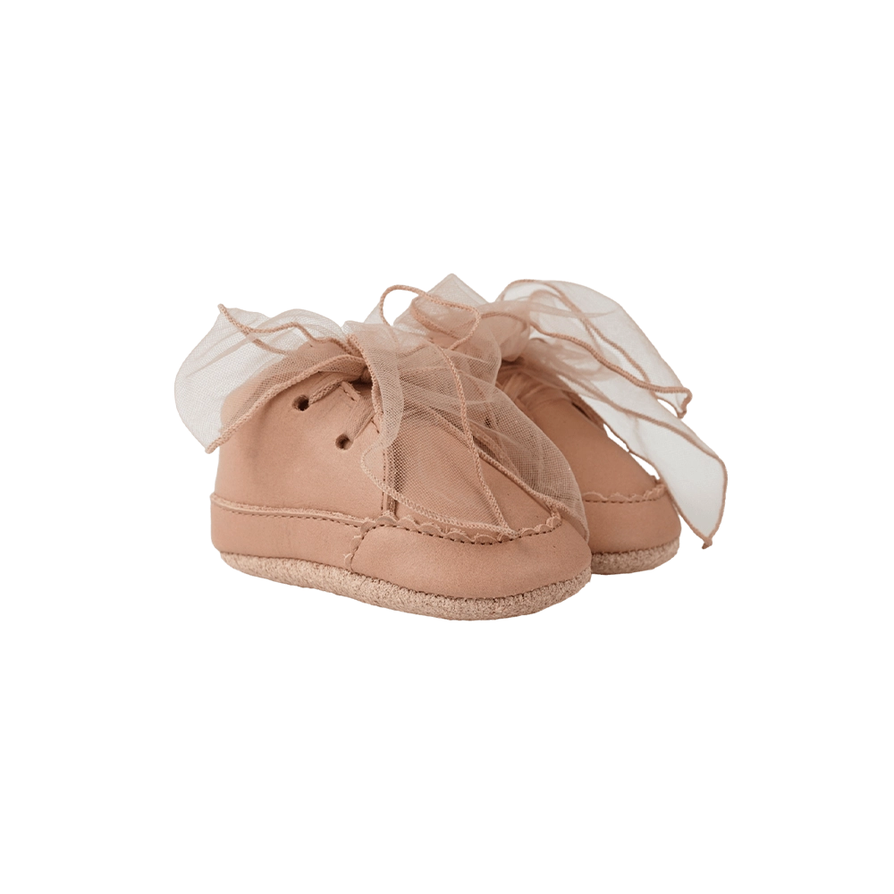 Donsje Lonny baby sneakers in Rose Dawn Classic Leather, with chiffon bows, angled front view