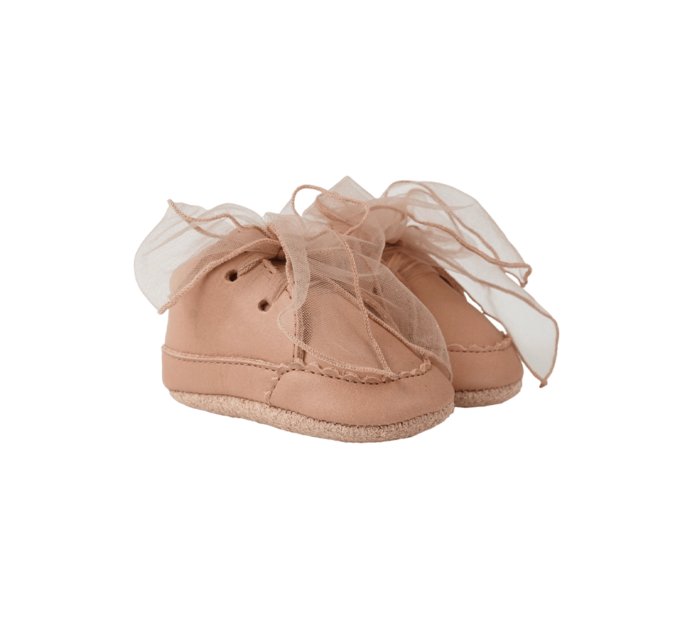 Donsje Lonny baby sneakers in Rose Dawn Classic Leather, with chiffon bows, angled front view