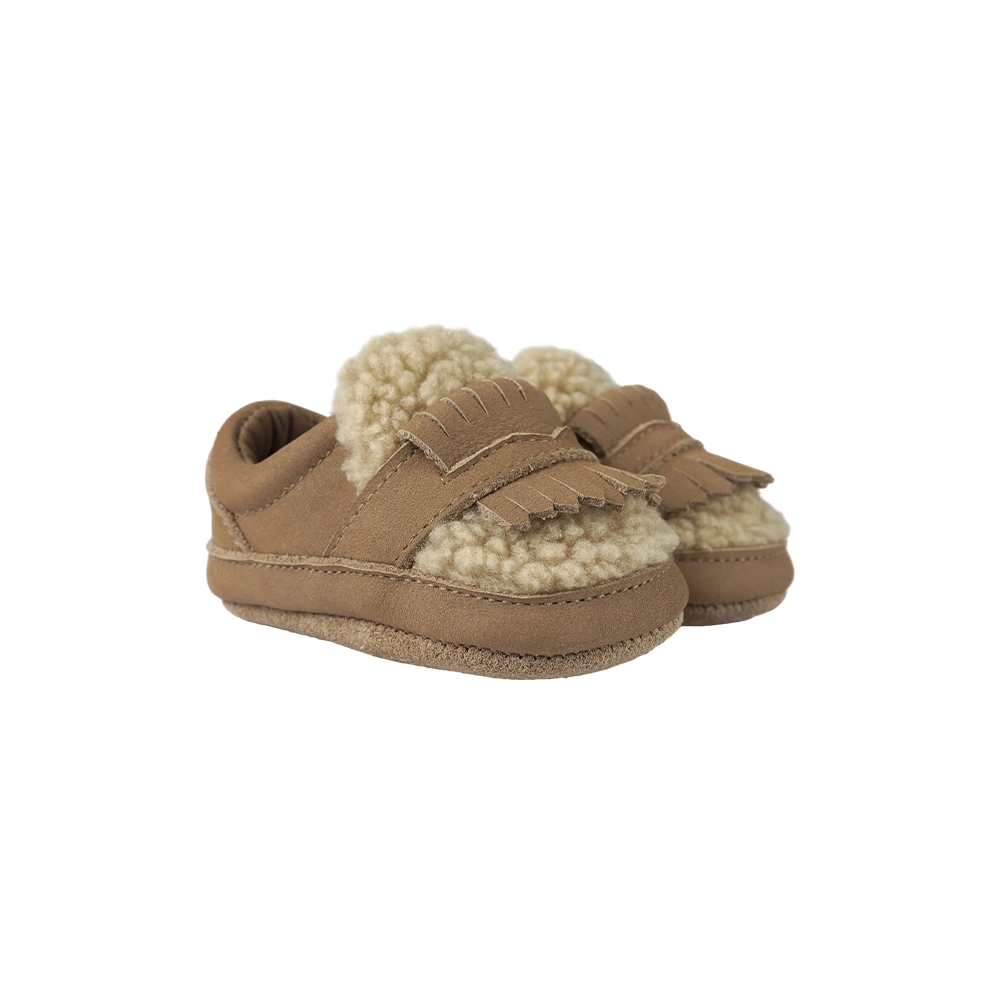Donsje Nolin baby loafers in Truffle Nubuck, with fringe details, angled front view