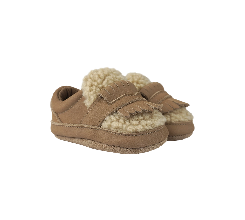 Donsje Nolin baby loafers in Truffle Nubuck, with fringe details, angled front view