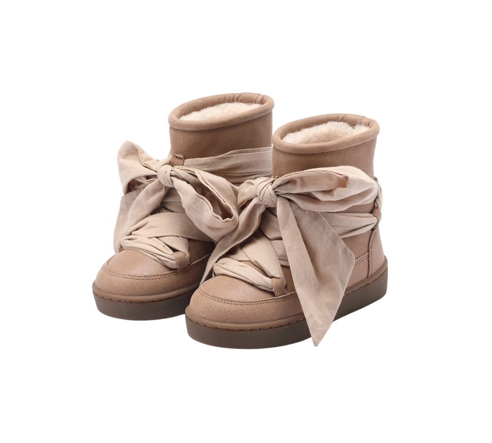 Donsje Ganza kids boots in Hazelnut Leather, with bow laces, angled front view