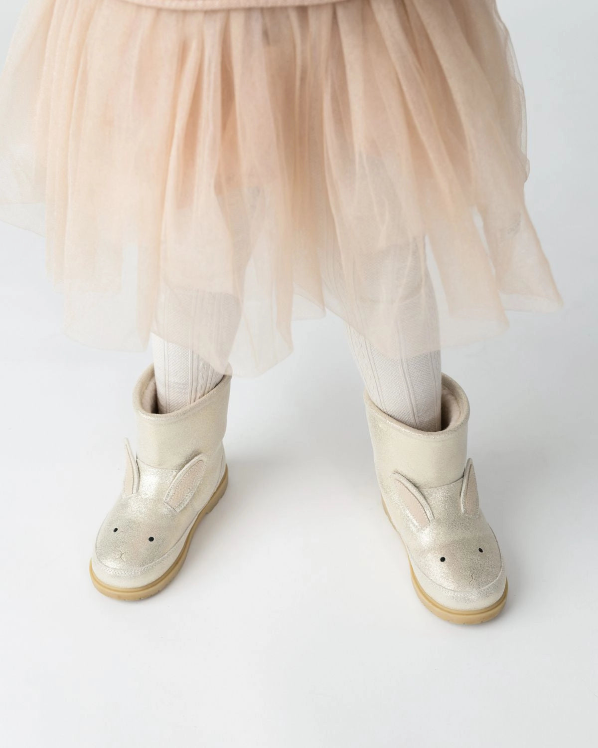 Donsje Xelly Bunny kids boots in Silver Metallic Leather, worn with a beige skirt