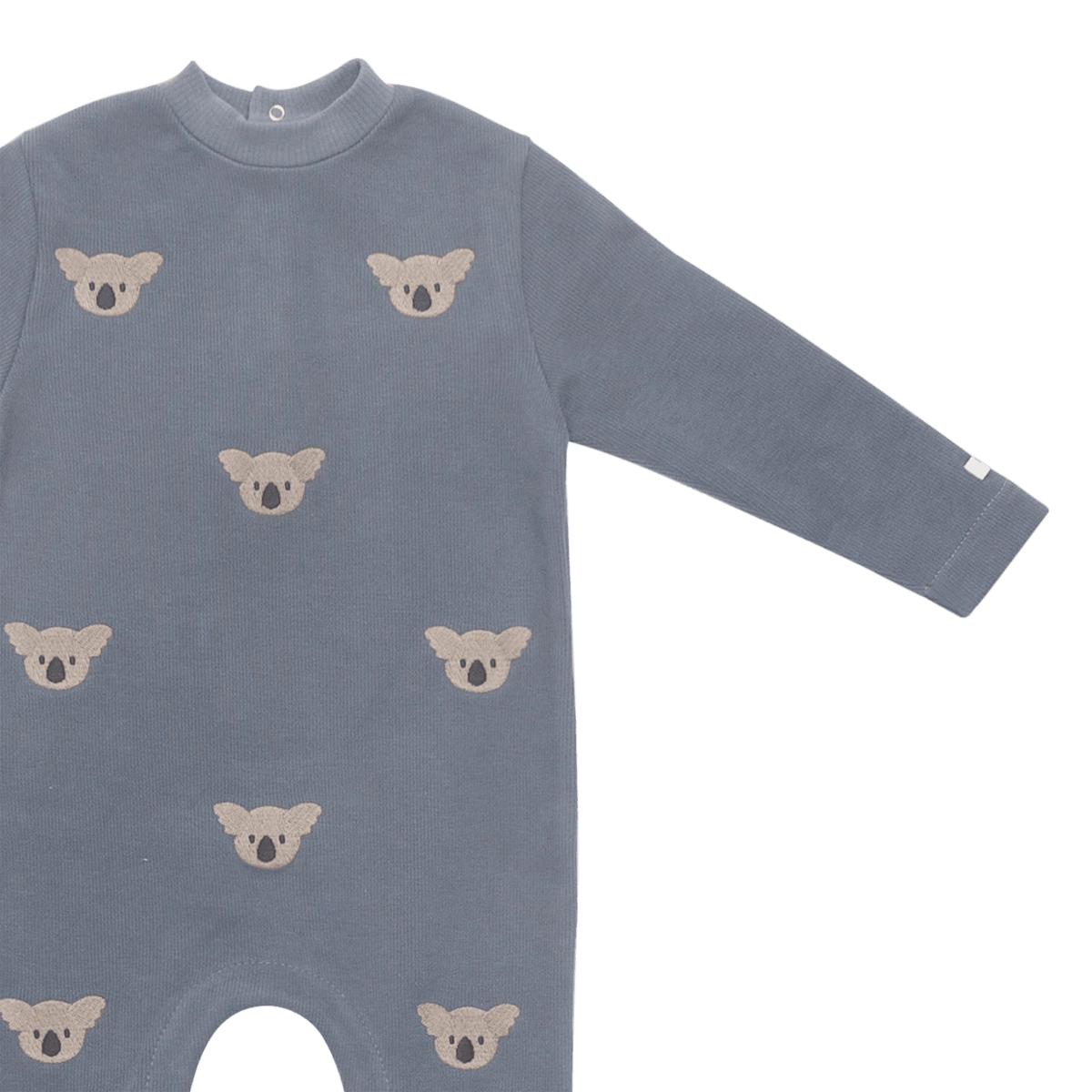 Donsje Phlyn Koalas onesie in Dark Spruce, close-up of the front and sleeve