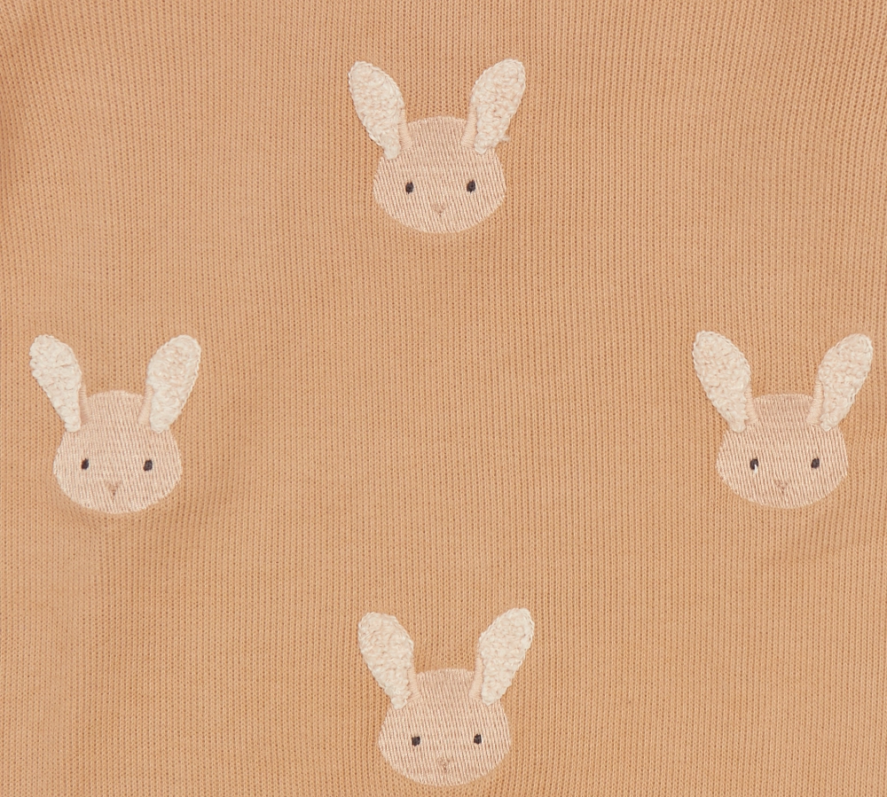 Donsje Phlyn Fluffy Bunnies onesie in Rose Mocha, close-up of embroidered bunny motifs