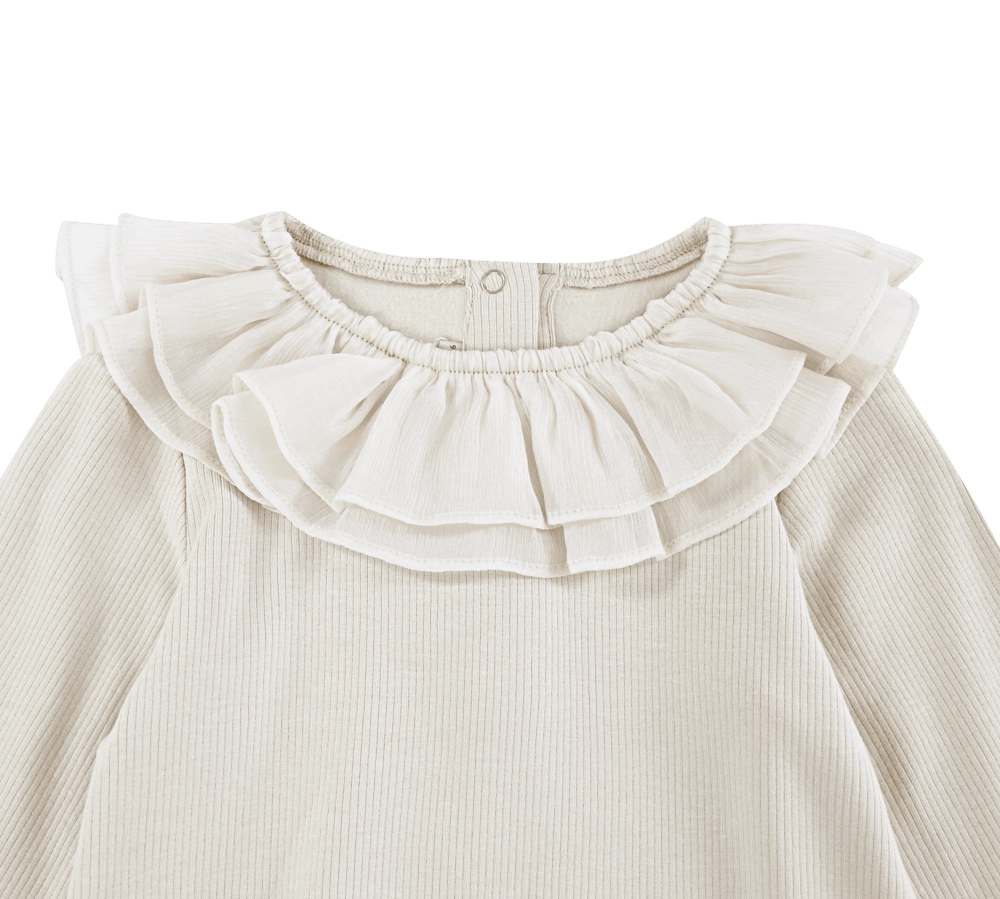 Donsje Fabien bodysuit in Birch, close-up of the ruffled collar