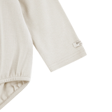 Donsje Fabien bodysuit in Birch, close-up of the sleeve and cuff