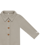 Donsje Finnian Bears bodysuit in Dusty Green, close-up of the front and sleeve