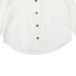 Donsje Chee shirt in Crispy White, close-up of the buttons and curved hem
