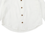 Donsje Chee shirt in Crispy White, close-up of the buttons and curved hem