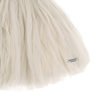 Donsje Kya skirt in Warm White, close-up of the fabric and brand label