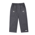 Donsje Kassim Koala trousers in Cloudy Grey, front view with koala pocket details