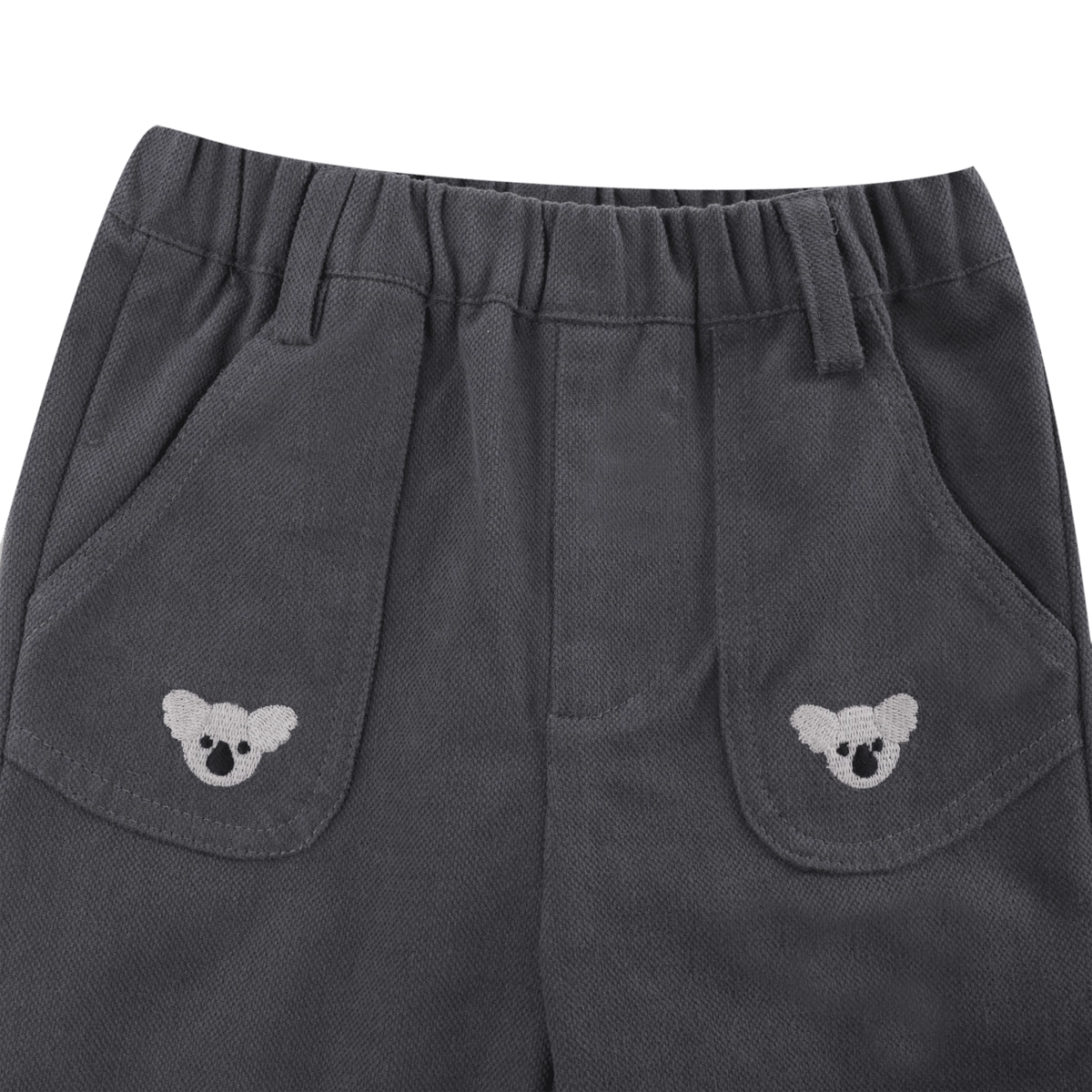 Donsje Kassim Koala trousers in Cloudy Grey, close-up of the waistband and koala pockets