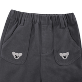Donsje Kassim Koala trousers in Cloudy Grey, close-up of the waistband and koala pockets