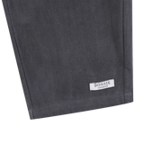 Donsje Kassim Koala trousers in Cloudy Grey, close-up of the hem and brand label