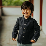 Donsje Lauden Koalas shirt in Blue Marine, worn by a child outdoors