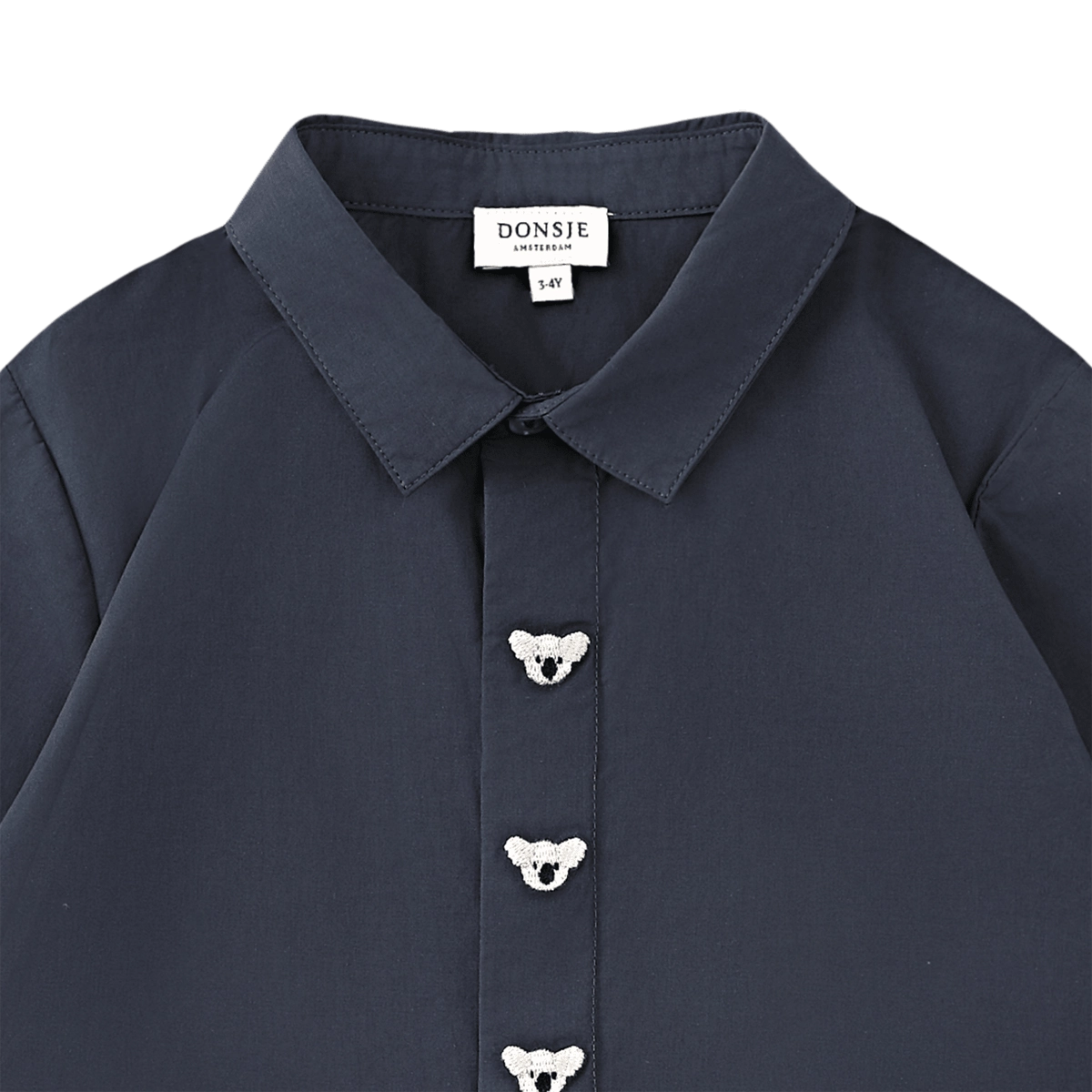 Donsje Lauden Koalas shirt in Blue Marine, close-up of the collar and koala details