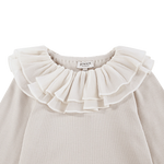 Donsje Florentien top in Birch, close-up of the ruffled collar