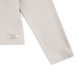 Donsje Florentien top in Birch, close-up of the sleeve and brand label